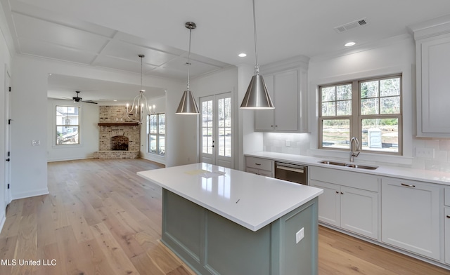 614 Cobalt Way, Brandon, MS 39042 - kitchen featuring tasteful backsplash, a center island, sink, and dishwasher