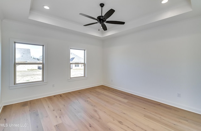614 Cobalt Way, Brandon, MS 39042 - spare room with a tray ceiling, ornamental molding, light hardwood / wood-style floors, and ceiling fan
