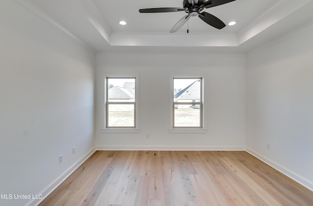 614 Cobalt Way, Brandon, MS 39042 - unfurnished room featuring a tray ceiling, light hardwood / wood-style flooring, ornamental molding, and ceiling fan