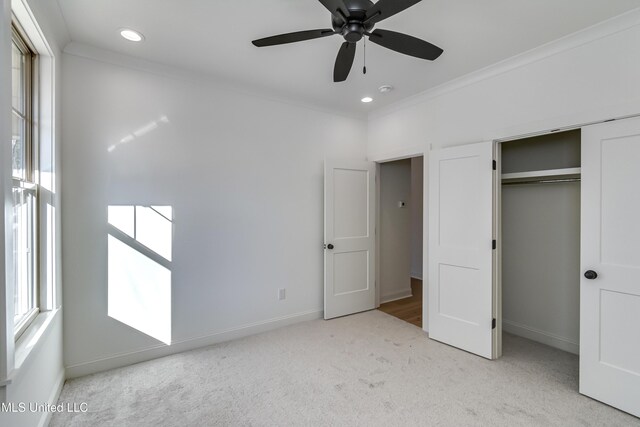 614 Cobalt Way, Brandon, MS 39042 - unfurnished bedroom with crown molding, light colored carpet, ceiling fan, and a closet
