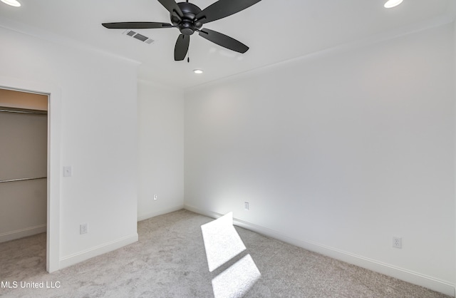 614 Cobalt Way, Brandon, MS 39042 - unfurnished bedroom with a walk in closet, light colored carpet, a closet, and ceiling fan