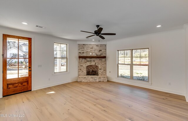 614 Cobalt Way, Brandon, MS 39042 - unfurnished living room featuring a wealth of natural light and light wood-type flooring