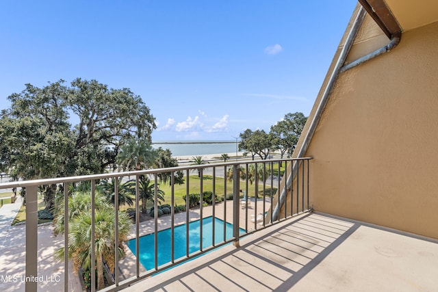 balcony featuring a water view