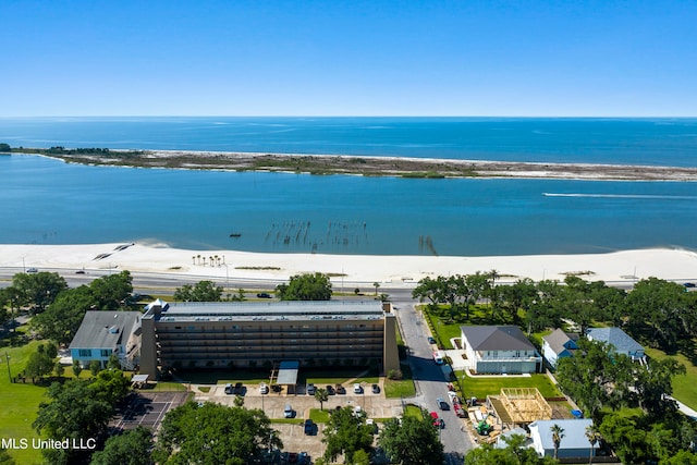 bird's eye view with a view of the beach and a water view