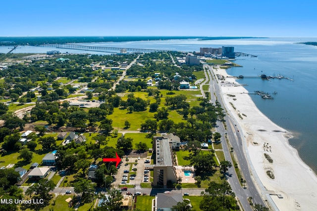 aerial view featuring a view of the beach and a water view