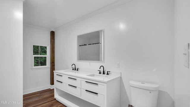 9083 Old River Rd Lot 1, Petal, MS 39465 - bathroom with crown molding, baseboards, double vanity, wood finished floors, and toilet