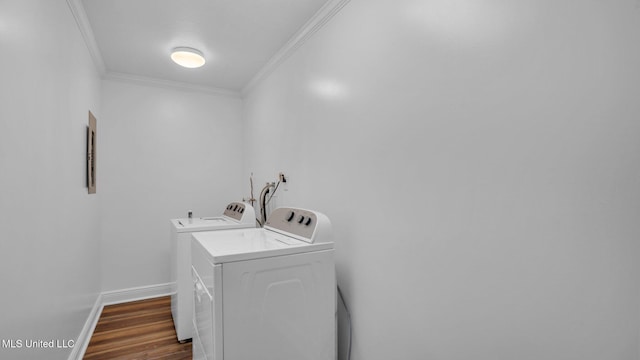 9083 Old River Rd Lot 1, Petal, MS 39465 - laundry room featuring washing machine and dryer, ornamental molding, dark wood-type flooring, and baseboards