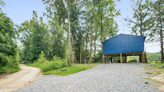 9083 Old River Rd Lot 1, Petal, MS 39465 - view of dirt / gravel driveway with stairs