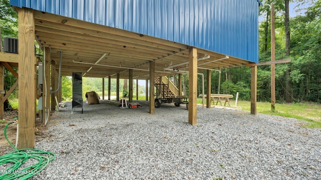 9083 Old River Rd Lot 1, Petal, MS 39465 - view of patio / terrace featuring a carport, driveway, and stairway
