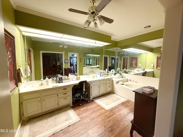 26 Woodgate Dr, Brandon, MS 39042 - bathroom featuring vanity, a ceiling fan, ornamental molding, and hardwood / wood-style floors