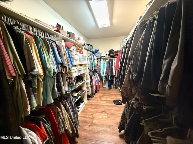 26 Woodgate Dr, Brandon, MS 39042 - walk in closet with light wood finished floors