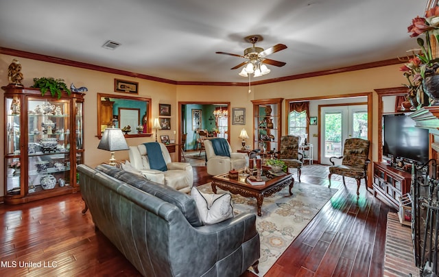 26 Woodgate Dr, Brandon, MS 39042 - living area with visible vents, crown molding, ceiling fan, and wood finished floors
