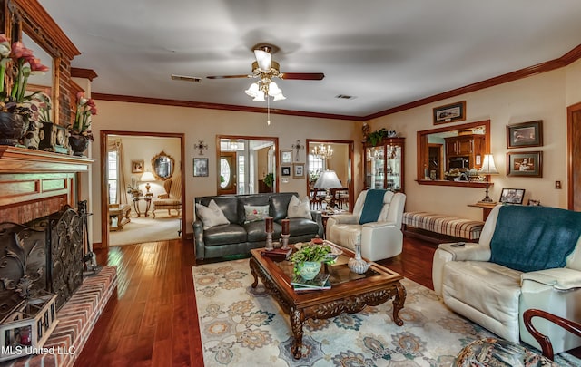 26 Woodgate Dr, Brandon, MS 39042 - living room featuring a ceiling fan, visible vents, hardwood / wood-style floors, and a fireplace