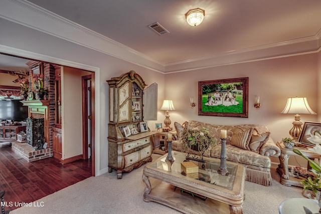 26 Woodgate Dr, Brandon, MS 39042 - carpeted living room with visible vents, ornamental molding, baseboards, and a brick fireplace