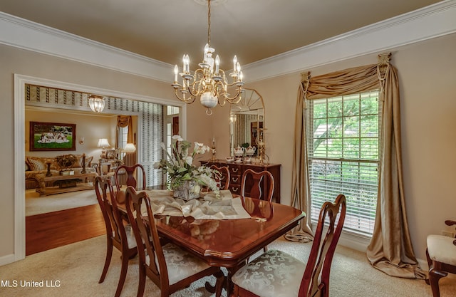 26 Woodgate Dr, Brandon, MS 39042 - dining room with an inviting chandelier, ornamental molding, and carpet