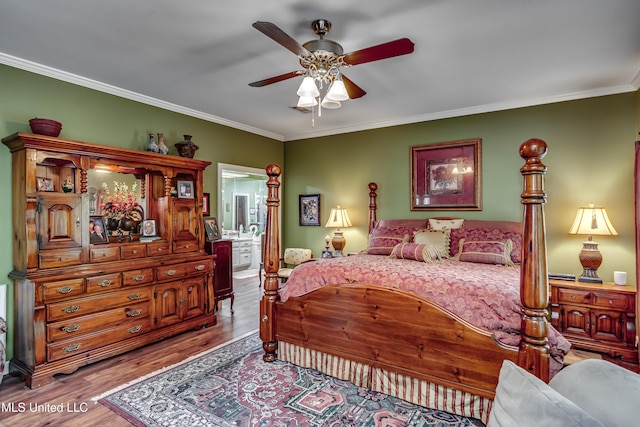26 Woodgate Dr, Brandon, MS 39042 - bedroom featuring crown molding, wood finished floors, and ensuite bath