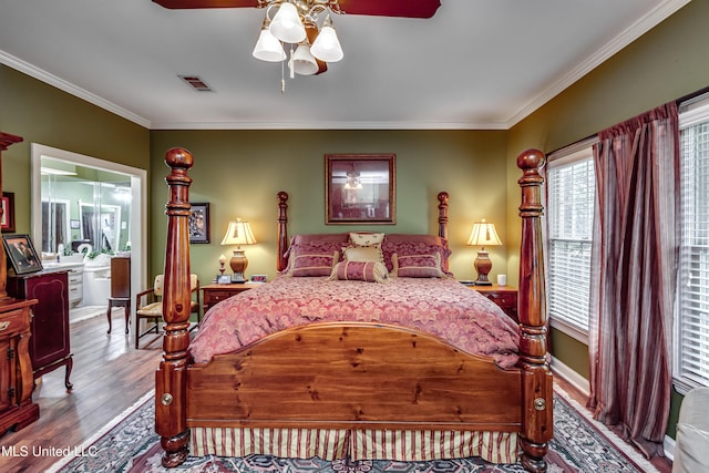 26 Woodgate Dr, Brandon, MS 39042 - bedroom featuring ornamental molding, a ceiling fan, wood finished floors, and visible vents