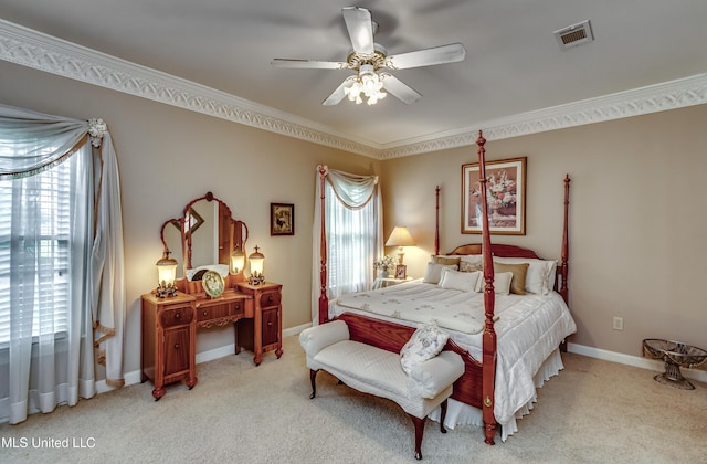 26 Woodgate Dr, Brandon, MS 39042 - bedroom featuring crown molding, light colored carpet, a ceiling fan, baseboards, and visible vents