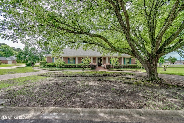 26 Woodgate Dr, Brandon, MS 39042 - ranch-style home featuring brick siding and a front lawn