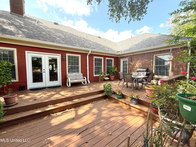 26 Woodgate Dr, Brandon, MS 39042 - wooden deck with french doors and outdoor dining space