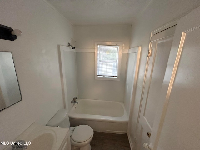 full bathroom featuring vanity, toilet, a textured ceiling, and bathing tub / shower combination