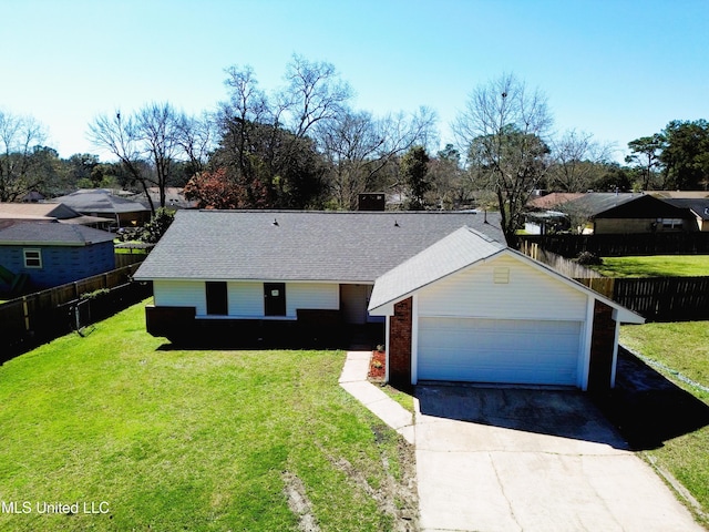 single story home featuring driveway, a shingled roof, a front yard, and fence