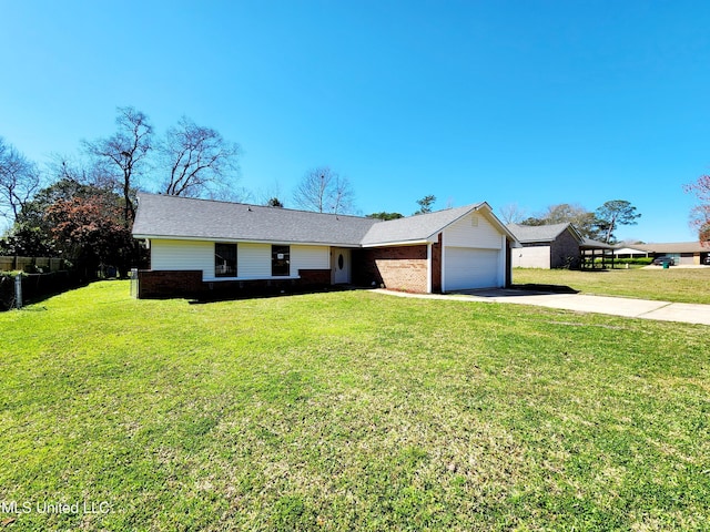 ranch-style house with brick siding, an attached garage, concrete driveway, and a front yard