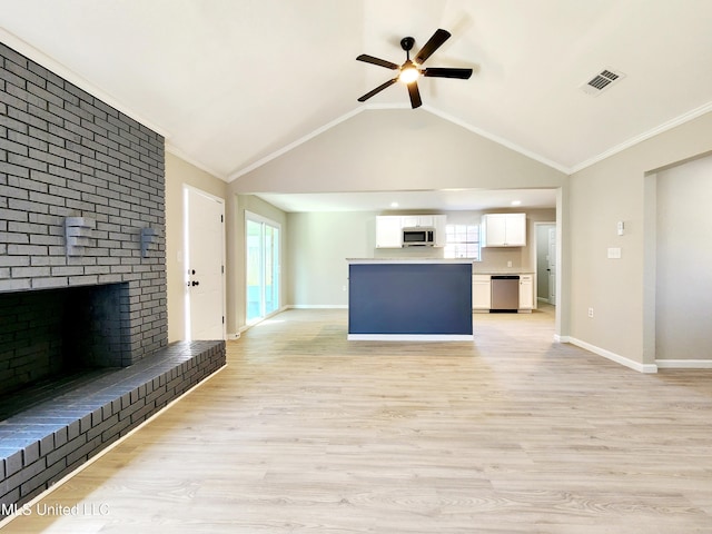 unfurnished living room with visible vents, a brick fireplace, ceiling fan, baseboards, and light wood-style floors