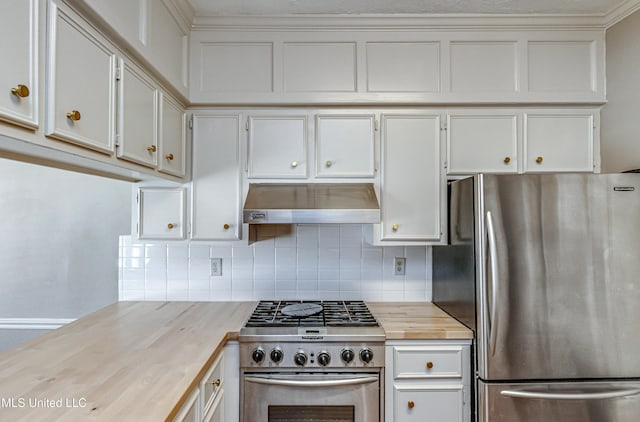 kitchen with range hood, white cabinetry, wood counters, and stainless steel appliances