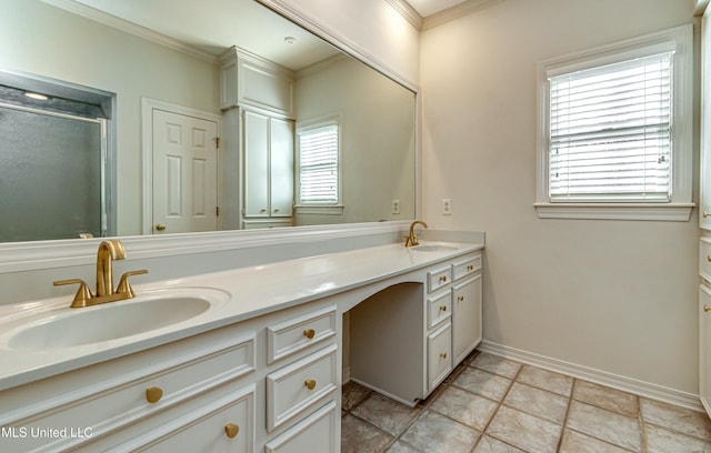 bathroom featuring walk in shower, ornamental molding, a healthy amount of sunlight, and vanity