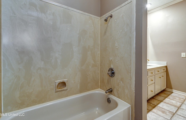 bathroom featuring vanity, tile patterned flooring, and bathing tub / shower combination