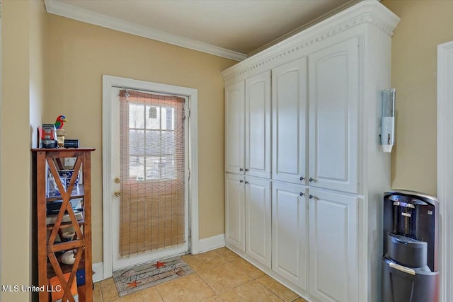 doorway with light tile patterned floors and ornamental molding