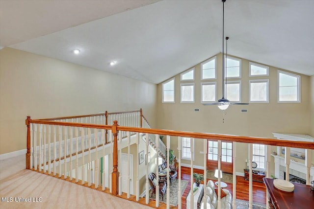 corridor featuring lofted ceiling