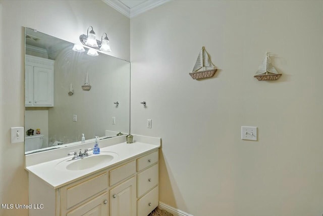 bathroom featuring vanity and crown molding