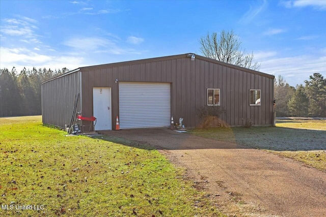 garage with a lawn