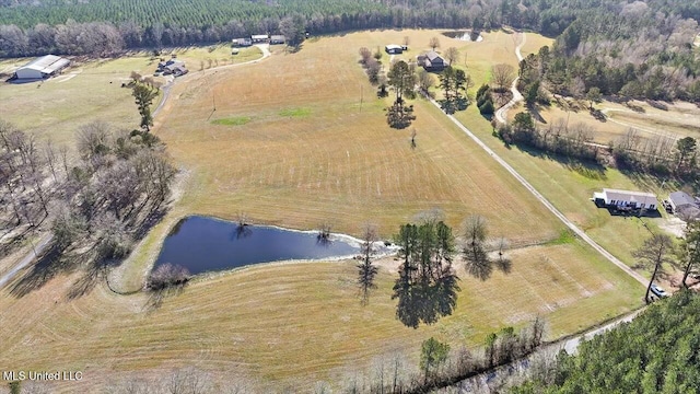 aerial view with a rural view and a water view