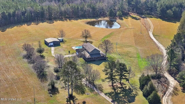 birds eye view of property with a rural view and a water view