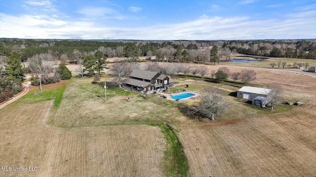 birds eye view of property featuring a rural view