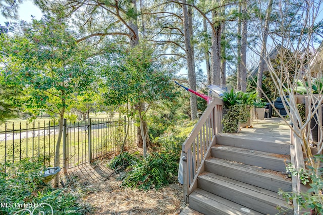 107 Hawks Nest Blf, Ridgeland, MS 39157 - view of yard featuring fence and a deck