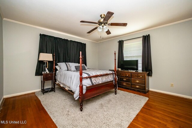 bedroom featuring baseboards, ceiling fan, ornamental molding, and wood finished floors
