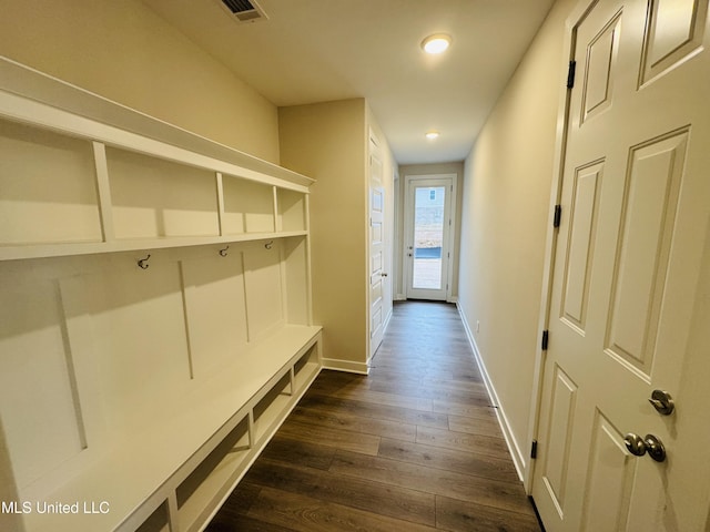 mudroom featuring dark wood finished floors, recessed lighting, and baseboards