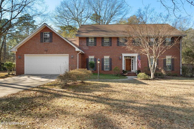 95 Sweet Bay Trl, Petal, MS 39465 - colonial inspired home featuring brick siding, driveway, and a front yard
