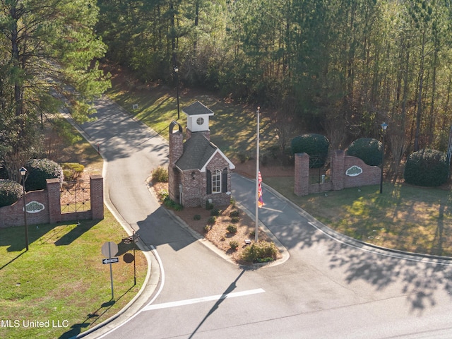 95 Sweet Bay Trl, Petal, MS 39465 - aerial view of property and surrounding area with a forest