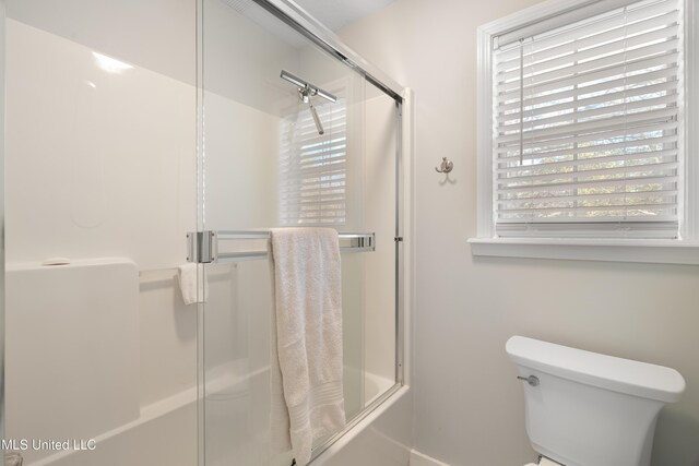 95 Sweet Bay Trl, Petal, MS 39465 - bathroom featuring toilet, plenty of natural light, and shower / bath combination with glass door
