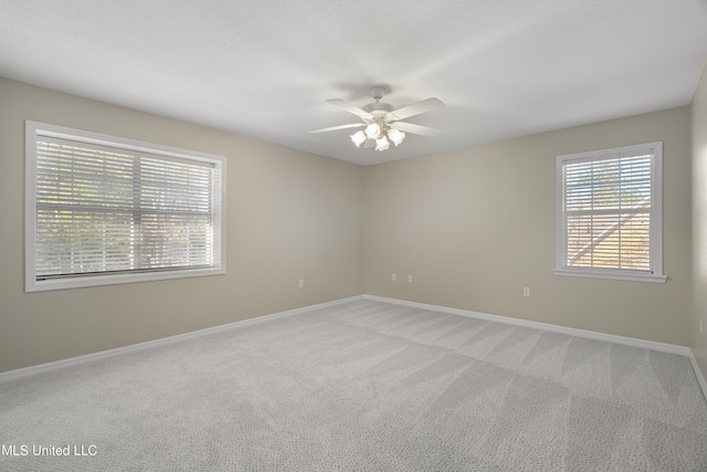95 Sweet Bay Trl, Petal, MS 39465 - unfurnished room with light colored carpet, a ceiling fan, and baseboards