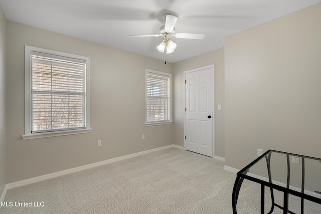 95 Sweet Bay Trl, Petal, MS 39465 - unfurnished bedroom with carpet floors, multiple windows, baseboards, and a ceiling fan