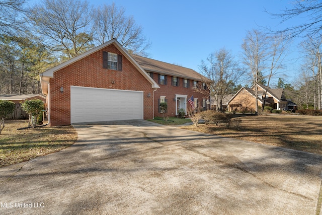 95 Sweet Bay Trl, Petal, MS 39465 - view of front of home featuring brick siding, driveway, and a garage