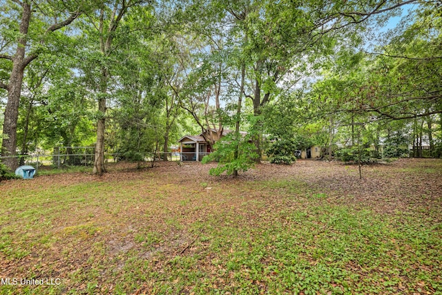 view of yard with fence