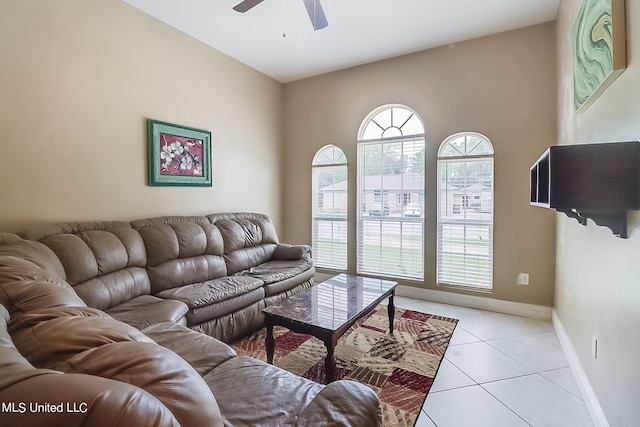 152 Sycamore Dr, Pass Christian, MS 39571 - living room featuring a ceiling fan, light tile patterned floors, and baseboards