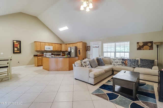 152 Sycamore Dr, Pass Christian, MS 39571 - living area featuring high vaulted ceiling and light tile patterned floors